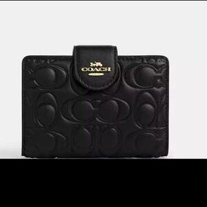 Coach medium corner zip wallet in signature leather